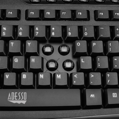Adesso WKB-1330CB 2.4 GHz Wireless Desktop Keyboard and Mouse Combo - USB Membrane Wireless RF 2.40 GHz Keyboard - 103 Key - English (US) - Black - USB Wireless RF Mouse - Optical - 1200 dpi - Scroll Wheel - QWERTY - Black - Internet Key, Play/Pause, Previous Track, Next Track, Volume Down, Volume U ize with full desktop function ality.  Multimedia a