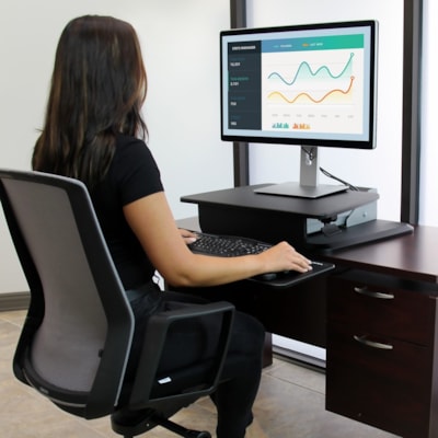StarTech.com Height Adjustable Standing Desk Converter - Sit Stand Desk with One-finger Adjustment - Ergonomic Desk - Turn your desk into a sit-stand workspace with easy height adjustment for increased comfort and productivity - Sit-to-Stand Workstation - Pneumatic spring for one-touch adjustment -   STND 
