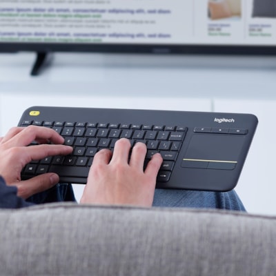 Logitech K400 Plus Wireless Touch TV Keyboard With Easy Media Control and Built-in Touchpad, HTPC Keyboard for PC-connected TV, Windows, Android, Chrome OS, Laptop, Tablet (Dark) (French Layout) - Wireless Connectivity - RF - 32.81 ft (10000 mm) - 2.40 GHz - USB Interface - Mute, Volume Down, Volume 0WRLS 