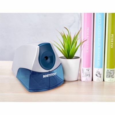 Bostitch Personal Electric Pencil Sharpener - Desktop - 1 Hole(s) - Helical - 4.25" (107.95 mm) Height x 4" (101.60 mm) Width - Blue, Silver - 1 Each HHC CUTTER TECHNOLOGY HIGH CAP SHAVINGS TRAY  BLUE