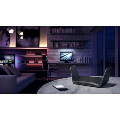 Netgear Nighthawk RAXE300 Wi-Fi 6E IEEE 802.11 a/b/g/n/ac/ax Ethernet Wireless Router - Tri Band - 2.40 GHz ISM Band - 5 GHz UNII Band - 6 x Antenna(6 x Internal) - 998.40 MB/s Wireless Speed - 5 x Network Port - 1 x Broadband Port - USB - 2.5 Gigabit Ethernet - VPN Supported  WRLS 