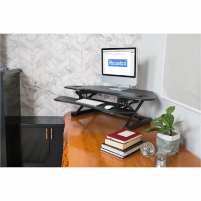 Rocelco 46"W-18"H Corner Adjustable Desk Riser - 40 lb (18143.69 g) Load Capacity - 18" (457.20 mm) Height x 46" (1168.40 mm) Width - Desk - Black - For Monitor, Notebook, Desktop - Ergonomic, Keyboard Tray, Grommet, Cable Management, Adjustable, Space Saving Design table Desk Riser 